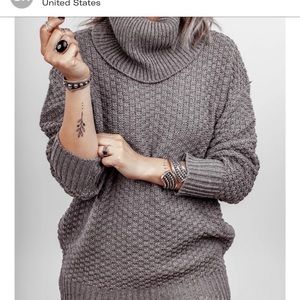 Knit turtleneck sweater in grey color